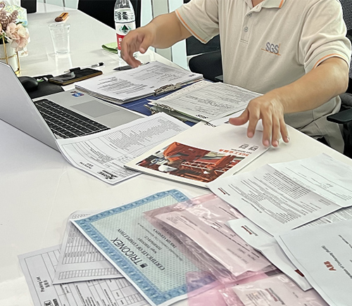 Inspector reviewing supplier and product documentation