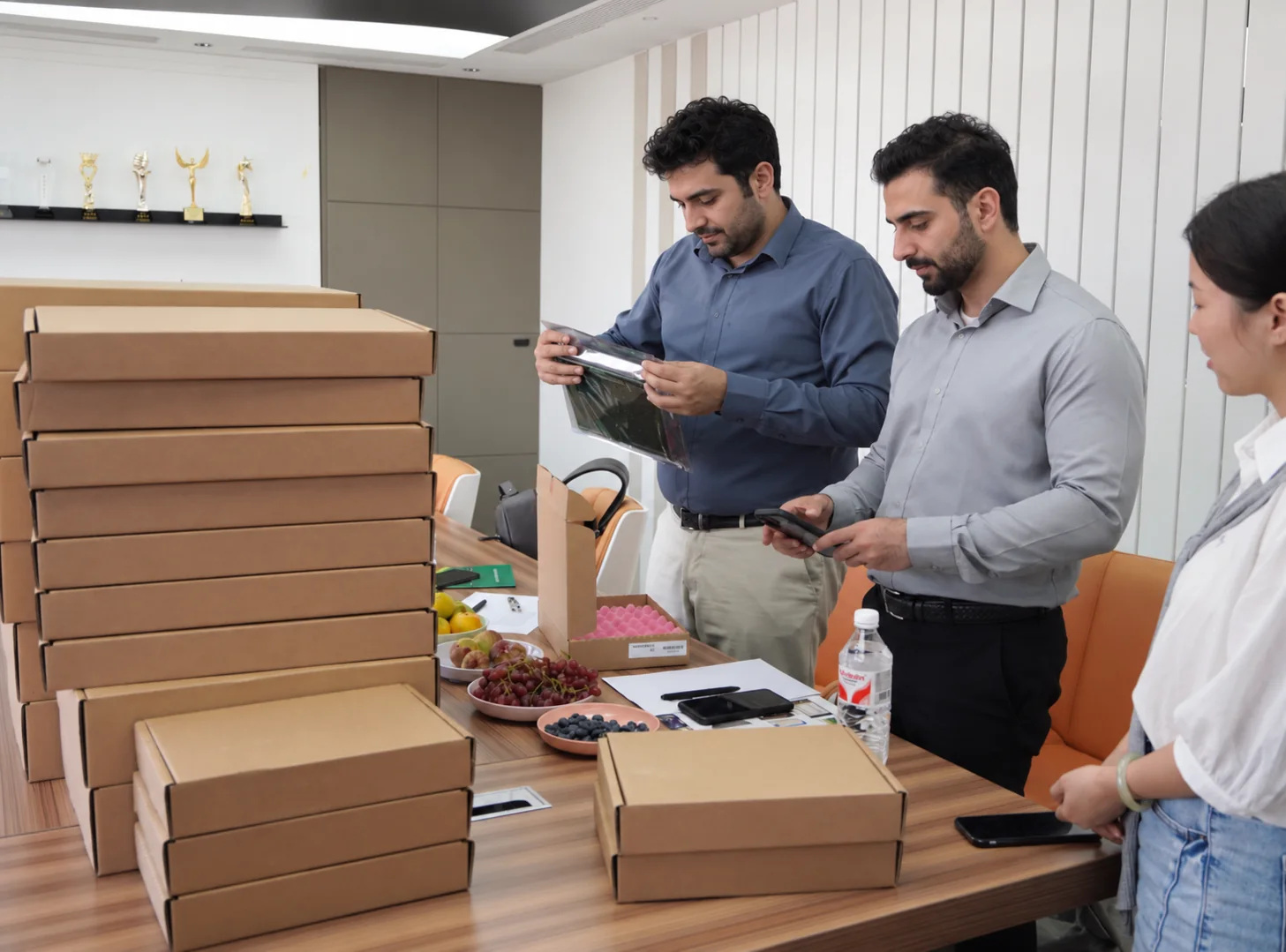 Dubai customers reviewing GE turbine-control cards at Apter Power