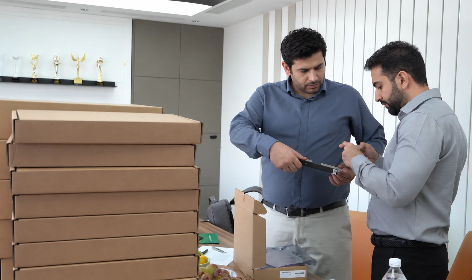 Customer representatives checking a GE turbine-control card